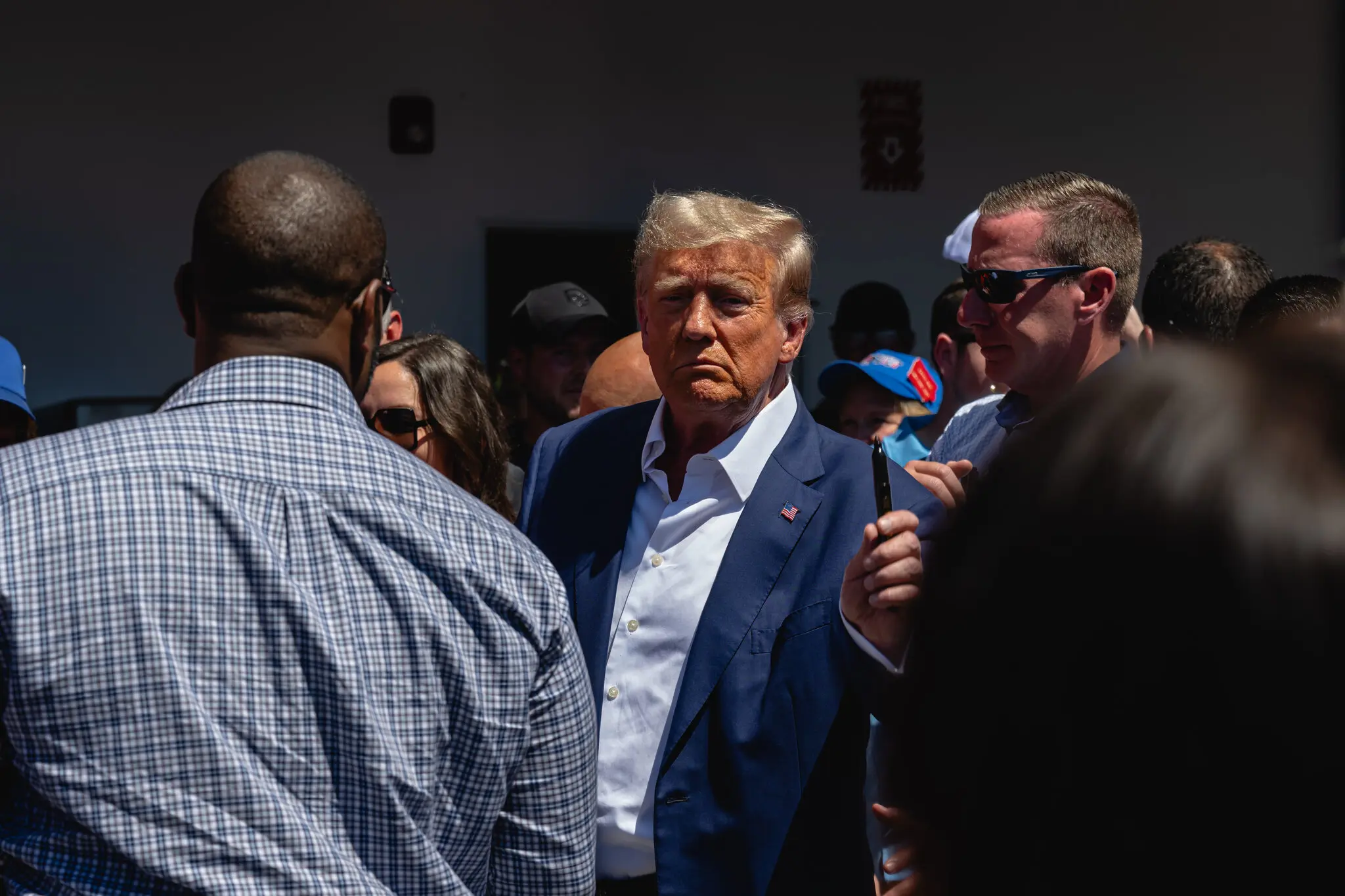 Містеру Трампу та його союзникам висунули звинувачення згідно з Законом штату про корумповані та рекетирські організації.
